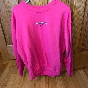 Pink “Nike” sweatshirt